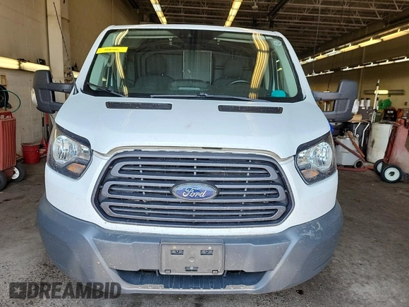 2018 Ford Transit with VIN 1FTYR1YG1JKB52228, listed as a IAAI auction lot 42832860 with 129,473 mi miles and . Bid and sale history available at DreamBid. Image 20.