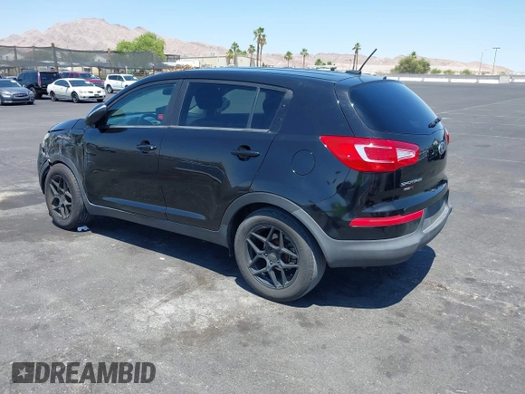 2013 Kia Sportage LX with VIN KNDPBCA25D7449584, listed as a IAAI auction lot 42489414 with 100,993 mi miles and . Bid and sale history available at DreamBid. Image 3.