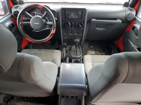 2007 Jeep Wrangler Unlimited Rubicon with VIN 1J4GA69177L102392, listed as a Copart auction lot 53195215 with 166,296 mi miles and Salvage title. Bid and sale history available at DreamBid. Image 8.