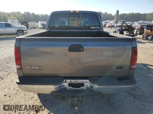 2003 Ford Super Duty F-250 XL with VIN 1FTNW20F73EB02536, listed as a Copart auction lot 77330394 with 170,102 mi miles and Salvage Title. Bid and sale history available at carsss.com. Image 6.