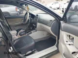 2008 Kia Spectra EX with VIN KNAFE122985511931, listed as a IAAI auction lot 42111053 with 251,276 mi miles. Bid and sale history available at carsss.com. Image 5.