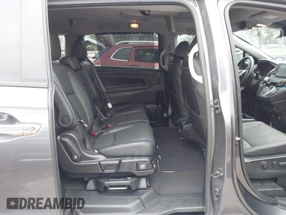2021 Honda Odyssey Touring with VIN 5FNRL6H86MB021504, listed as a IAAI auction lot 41550040 with 55,068 mi miles. Bid and sale history available at carsss.com. Image 8.