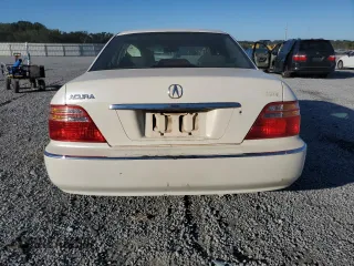 1999 Acura RL with VIN JH4KA9657XC008942, listed as a Copart auction lot 75336774 with 0 mi miles and Salvage Title. Bid and sale history available at carsss.com. Image 6.