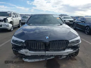 2019 BMW 5 Series M550i xDrive with VIN WBAJB9C51KB287797, listed as a IAAI auction lot 41549311 with 61,459 mi miles and . Bid and sale history available at DreamBid. Image 12.