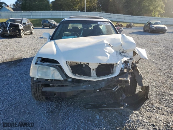 1999 Acura RL with VIN JH4KA9657XC008942, listed as a Copart auction lot 75336774 with NaN miles and Salvage Title. Bid and sale history available at carsss.com. Image 5.