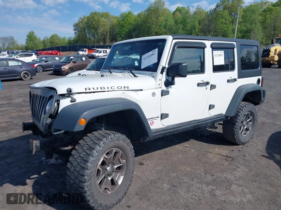 2014 Jeep Wrangler Unlimited Rubicon X with VIN 1C4BJWFG6EL240849, listed as a IAAI auction lot 42216082 with 118,912 mi miles and . Bid and sale history available at DreamBid. Image 17.