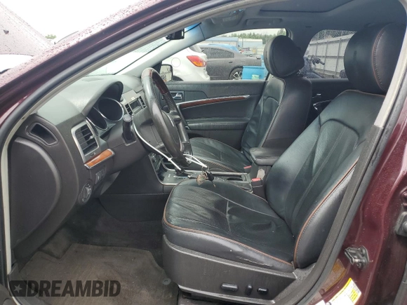 2011 Lincoln MKZ with VIN 3LNHL2JC0BR764654, listed as a Copart auction lot 57295725 with 141,056 mi miles and Salvage title. Bid and sale history available at DreamBid. Image 7.