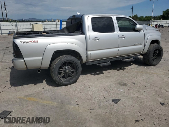 2012 Toyota Tacoma with VIN 5TFLU4ENXCX027960, listed as a Copart auction lot 60689025 with 209,480 mi miles and Salvage title. Bid and sale history available at DreamBid. Image 3.