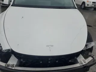 2023 Tesla Model Y Long Range z VIN 7SAYGDEE1PA114563, wystawiony jako Copart lot #44423505 z przebiegiem Nie podano mil oraz Szkody całkowita. Historia ofert i sprzedaży dostępna na DreamBid. Obrazek 11.