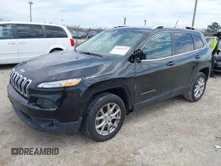 2014 Jeep Cherokee Latitude with VIN 1C4PJLCB6EW186576, listed as a IAAI auction lot 42099422 with 117,681 mi miles and . Bid and sale history available at DreamBid. Image 18.