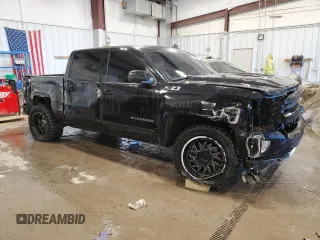 2017 Chevrolet Silverado 1500 LT with VIN 3GCUKREC8HG143224, listed as a Copart auction lot 87178744 with 136,297 mi miles and Salvage Title. Bid and sale history available at DreamBid. Image 4.