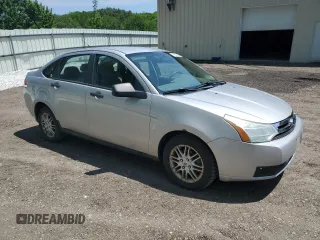 2009 Ford Focus SE z VIN 1FAHP35N99W210276, wystawiony jako Copart lot #59235675 z przebiegiem 143 828 mil mil oraz Czysty tytuł • Clean title. Historia ofert i sprzedaży dostępna na DreamBid. Obrazek 4.