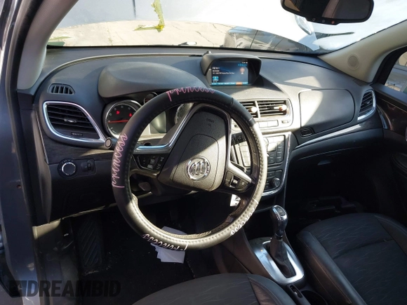 2015 Buick Encore with VIN KL4CJASB3FB168155, listed as a IAAI auction lot 41861563 with 57,574 mi miles. Bid and sale history available at carsss.com. Image 17.