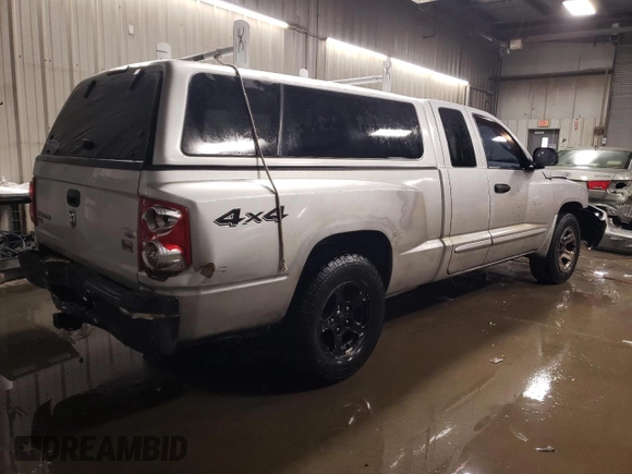2006 Dodge Dakota SLT with VIN 1D7HW42NX6S711998, listed as a Copart auction lot 80129394 with 214,546 mi miles and Salvage Title. Bid and sale history available at carsss.com. Image 3.