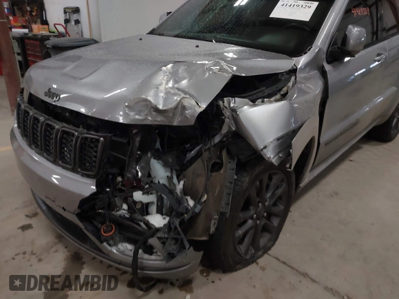 2018 Jeep Grand Cherokee High Altitude with VIN 1C4RJFCGXJC502580, listed as a IAAI auction lot 41419329 with 90,713 mi miles. Bid and sale history available at carsss.com. Image 6.