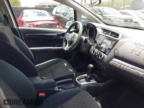 2017 Honda Fit LX z VIN 3HGGK5H58HM706357, wystawiony jako IAAI lot #42371826 z przebiegiem 91 099 mil mil oraz . Historia ofert i sprzedaży dostępna na DreamBid. Obrazek 5.