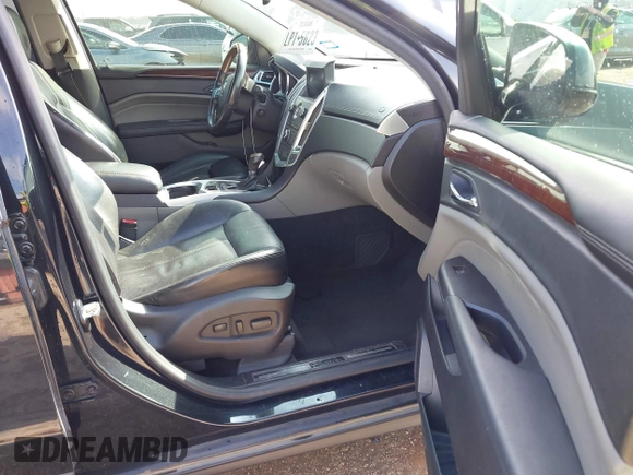 2011 Cadillac SRX Premium Collection with VIN 3GYFNCEYXBS588474, listed as a IAAI auction lot 41523026 with 288,448 mi miles. Bid and sale history available at carsss.com. Image 5.