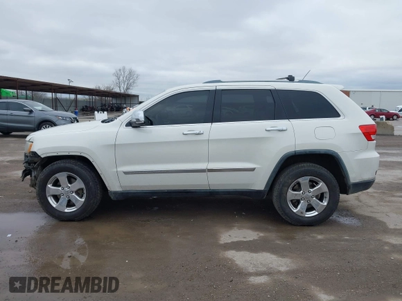 2012 Jeep Grand Cherokee Limited with VIN 1C4RJEBG4CC229571, listed as a IAAI auction lot 41565669 with 221,268 mi miles. Bid and sale history available at carsss.com. Image 14.