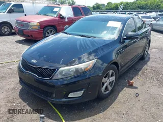 2014 Kia Optima LX with VIN 5XXGM4A72EG285974, listed as a IAAI auction lot 42667984 with 232,863 mi miles and . Bid and sale history available at DreamBid. Image 6.