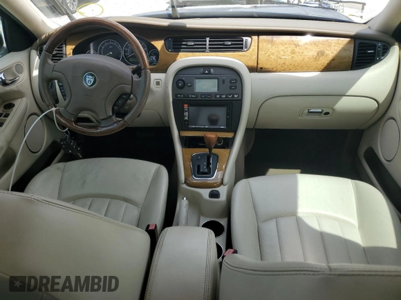 2004 Jaguar X-Type with VIN SAJEA51C44WD83361, listed as a Copart auction lot 55643545 with 54,615 mi miles and Salvage Title. Bid and sale history available at DreamBid. Image 8.