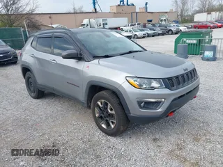 2018 Jeep Compass Trailhawk z VIN 3C4NJDDB7JT451646, wystawiony jako IAAI lot #41909622 z przebiegiem 118 423 mil mil oraz . Historia ofert i sprzedaży dostępna na DreamBid. Obrazek 1.