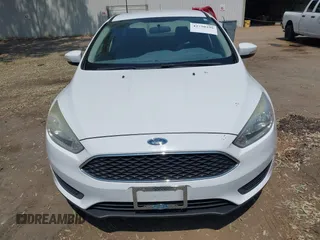 2016 Ford Focus SE z VIN 1FADP3F24GL268619, wystawiony jako IAAI lot #42750298 z przebiegiem 96 587 mil mil oraz . Historia ofert i sprzedaży dostępna na DreamBid. Obrazek 6.