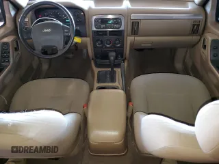 2002 Jeep Grand Cherokee with VIN 1J4GX38S52C166298, listed as a Copart auction lot 80655884 with 212,113 mi miles and Salvage title. Bid and sale history available at DreamBid. Image 8.