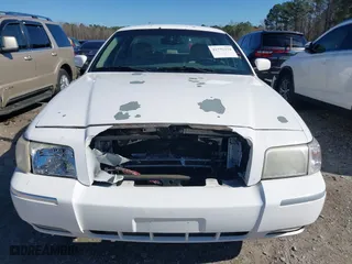2007 Mercury Grand Marquis LS with VIN 2MEFM75V57X630666, listed as a IAAI auction lot 41791234 with 155,290 mi miles. Bid and sale history available at carsss.com. Image 12.