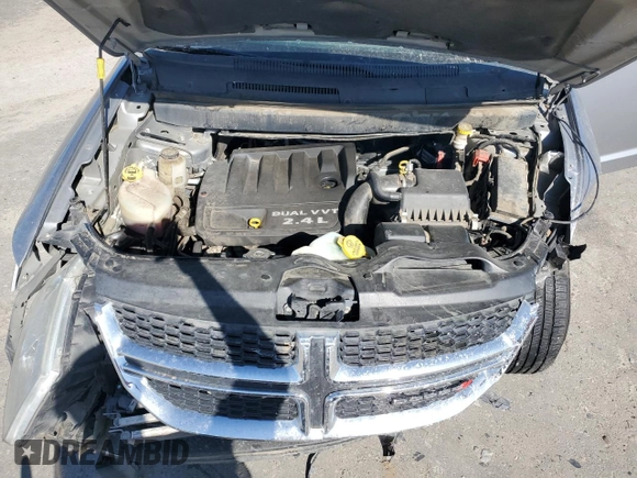 2015 Dodge Journey American Value with VIN 3C4PDCABXFT712192, listed as a Copart auction lot 55680975 with 104,579 mi miles and Salvage Title. Bid and sale history available at DreamBid. Image 12.