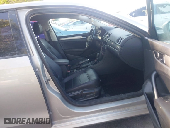 2014 Volkswagen Passat S with VIN 1VWAT7A33EC111206, listed as a IAAI auction lot 42684770 with 95,779 mi miles and . Bid and sale history available at DreamBid. Image 5.