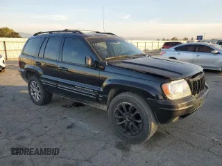 2001 Jeep Grand Cherokee Limited with VIN 1J4GX58S01C652737, listed as a Copart auction lot 81635494 with 175,498 mi miles and Salvage Title. Bid and sale history available at DreamBid. Image 4.