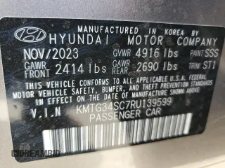 2024 Genesis G70 2.5T with VIN KMTG34SC7RU139599, listed as a Copart auction lot 62535435 with 9,416 mi miles and Salvage title. Bid and sale history available at DreamBid. Image 12.