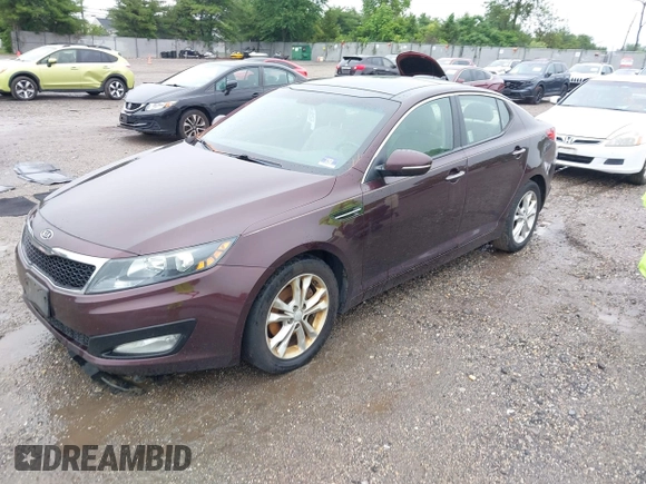 2012 Kia Optima EX z VIN 5XXGN4A71CG011465, wystawiony jako IAAI lot #42478460 z przebiegiem 197 230 mil mil oraz . Historia ofert i sprzedaży dostępna na DreamBid. Obrazek 2.