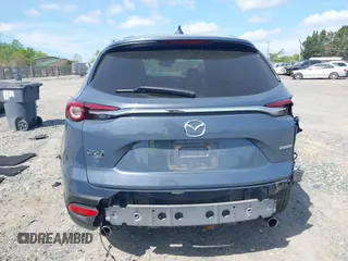 2022 Mazda CX-9 Grand Touring with VIN JM3TCBDY8N0628886, listed as a IAAI auction lot 42074044 with 67,867 mi miles and . Bid and sale history available at DreamBid. Image 17.