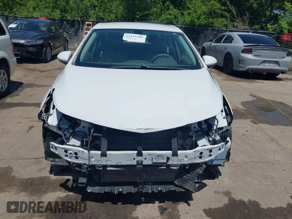 2017 Chevrolet Cruze LS z VIN 1G1BC5SM6H7257771, wystawiony jako IAAI lot #42211908 z przebiegiem 90 005 mil mil oraz . Historia ofert i sprzedaży dostępna na DreamBid. Obrazek 13.