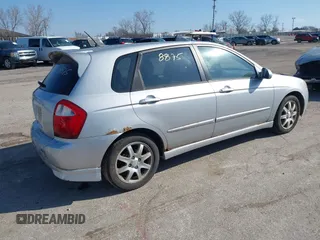 2006 Kia Spectra with VIN KNAFE161265317272, listed as a IAAI auction lot 42008875 with 169,983 mi miles. Bid and sale history available at carsss.com. Image 4.