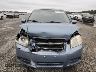 2007 Chevrolet Aveo LS z VIN KL1TD56607B126715, wystawiony jako Copart lot #85206134 z przebiegiem 85 420 mil mil oraz Szkody całkowita. Historia ofert i sprzedaży dostępna na DreamBid. Obrazek 5.