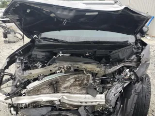 2021 Honda Passport Touring z VIN 5FNYF7H94MB005741, wystawiony jako Copart lot #57626664 z przebiegiem Nie podano mil oraz Szkoda całkowita • Salvage title. Historia ofert i sprzedaży dostępna na DreamBid. Obrazek 12.