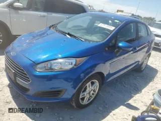 2018 Ford Fiesta SE z VIN 3FADP4BJXJM104459, wystawiony jako Copart lot #57915955 z przebiegiem 57 646 mil mil oraz Szkoda całkowita • Salvage title. Historia ofert i sprzedaży dostępna na DreamBid. Obrazek 1.
