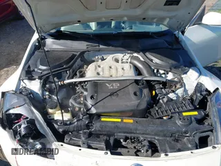 2006 Nissan 350Z Touring with VIN JN1AZ36AX6M450609, listed as a IAAI auction lot 41227538 with 111,622 mi miles. Bid and sale history available at carsss.com. Image 10.