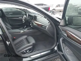 2017 BMW 5 Series 540i with VIN WBAJE5C3XHG917472, listed as a IAAI auction lot 41323501 with 123,247 mi miles and . Bid and sale history available at carsss.com. Image 5.