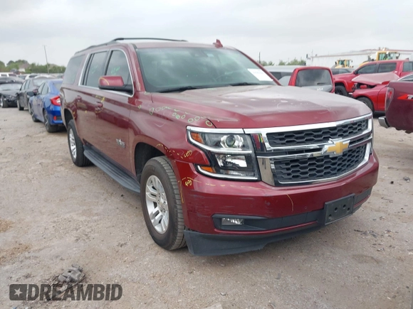 2020 Chevrolet Suburban LT z VIN 1GNSCHKC9LR233596, wystawiony jako IAAI lot #41943325 z przebiegiem 97 515 mil mil oraz . Historia ofert i sprzedaży dostępna na DreamBid. Obrazek 1.