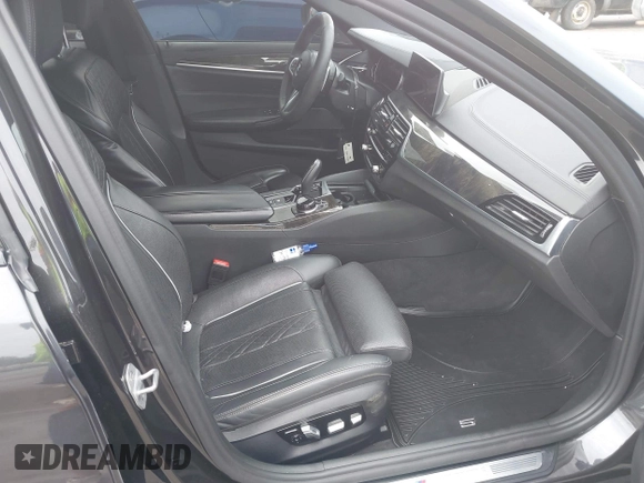 2018 BMW 5 Series M550i xDrive with VIN WBAJB9C56JB035364, listed as a IAAI auction lot 42179145 with 112,123 mi miles and . Bid and sale history available at DreamBid. Image 5.