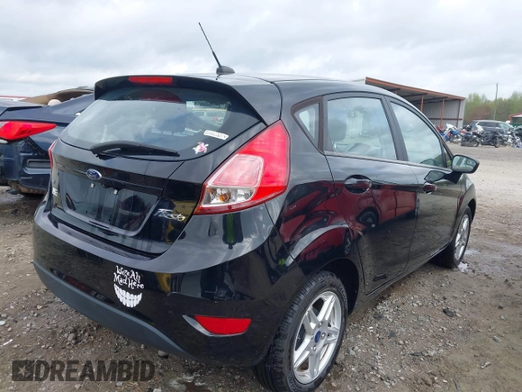2018 Ford Fiesta SE with VIN 3FADP4EJ0JM133190, listed as a IAAI auction lot 41952815 with 69,930 mi miles. Bid and sale history available at carsss.com. Image 4.