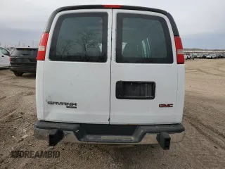 2014 GMC Savana Cargo Van with VIN 1GTW7FCAXE1909748, listed as a Copart auction lot 87214754 with 263,944 mi miles and Salvage Title. Bid and sale history available at carsss.com. Image 6.