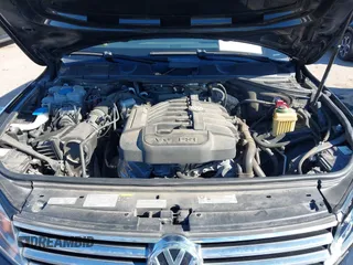 2016 Volkswagen Touareg Sport with VIN WVGEF9BP4GD012265, listed as a IAAI auction lot 41208383 with 69,205 mi miles and . Bid and sale history available at DreamBid. Image 10.