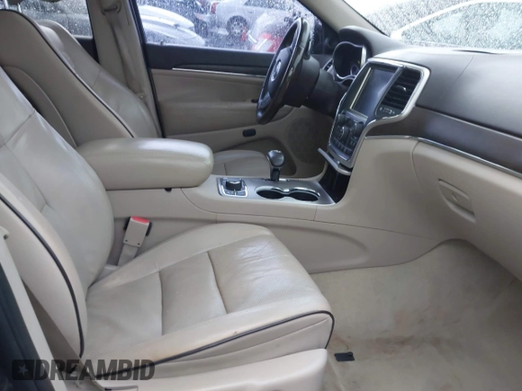 2014 Jeep Grand Cherokee Overland with VIN 1C4RJFCT2EC146239, listed as a IAAI auction lot 41368514 with 164,239 mi miles. Bid and sale history available at carsss.com. Image 5.