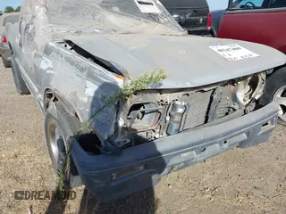 1995 Mitsubishi Mighty Max z VIN JA7LS21G6SP007394, wystawiony jako IAAI lot #40347460 z przebiegiem 89 606 mil mil oraz . Historia ofert i sprzedaży dostępna na DreamBid. Obrazek 15.