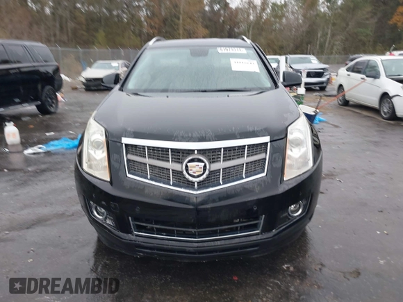 2011 Cadillac SRX Performance Collection with VIN 3GYFNBEYXBS597881, listed as a IAAI auction lot 41016643 with 164,781 mi miles and . Bid and sale history available at carsss.com. Image 12.