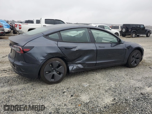 2023 Tesla Model 3 with VIN 5YJ3E1EA4PF641279, listed as a Copart auction lot 46031405 with 35,578 mi miles and Salvage Title. Bid and sale history available at DreamBid. Image 3.